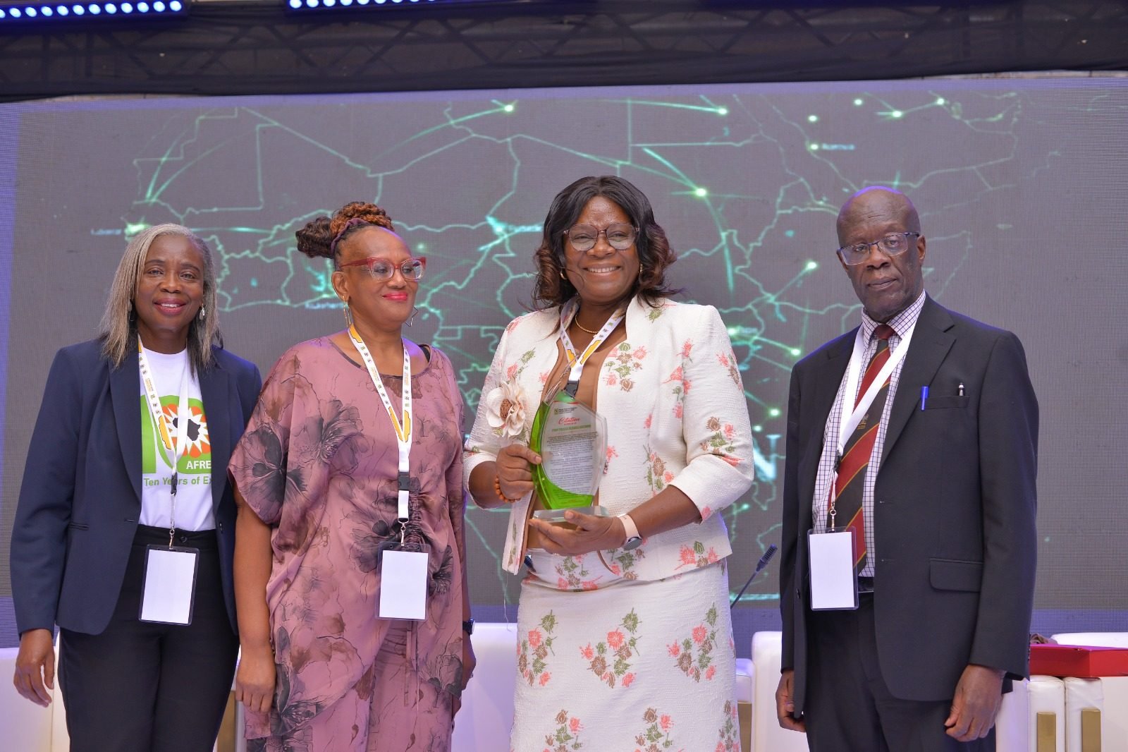 Professor Adejumo receiving an award at the AFREhealth Annual Conference