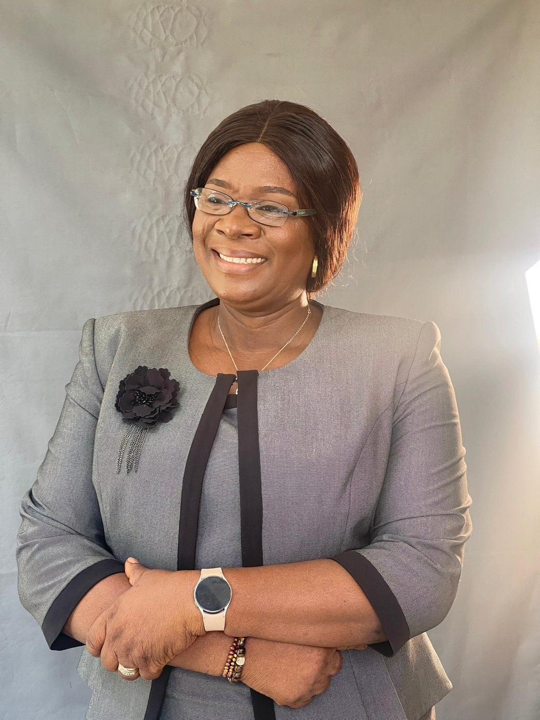 Professor Prisca Olabisi Adejumo smiling, in a grey suit